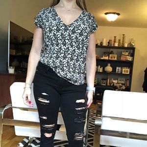 Joie black and white “lacy” top